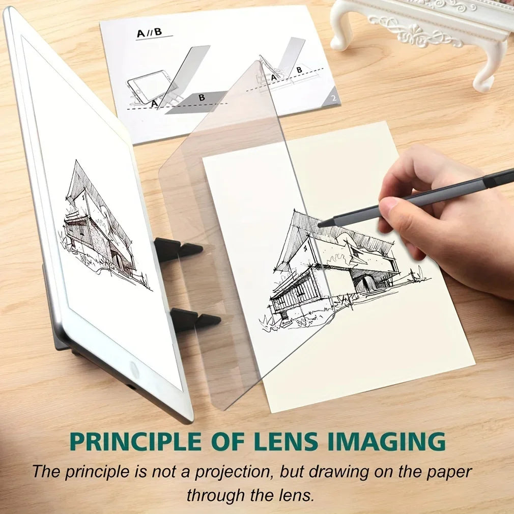 Planche à dessin optique Ludéo: un enfant trace sur sa feuille l'image vue à travers la vitre, un téléphone posé à plat à la base